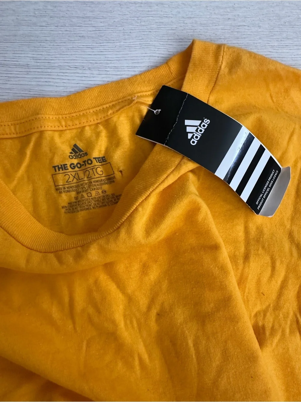 New yellow adidas tshirt